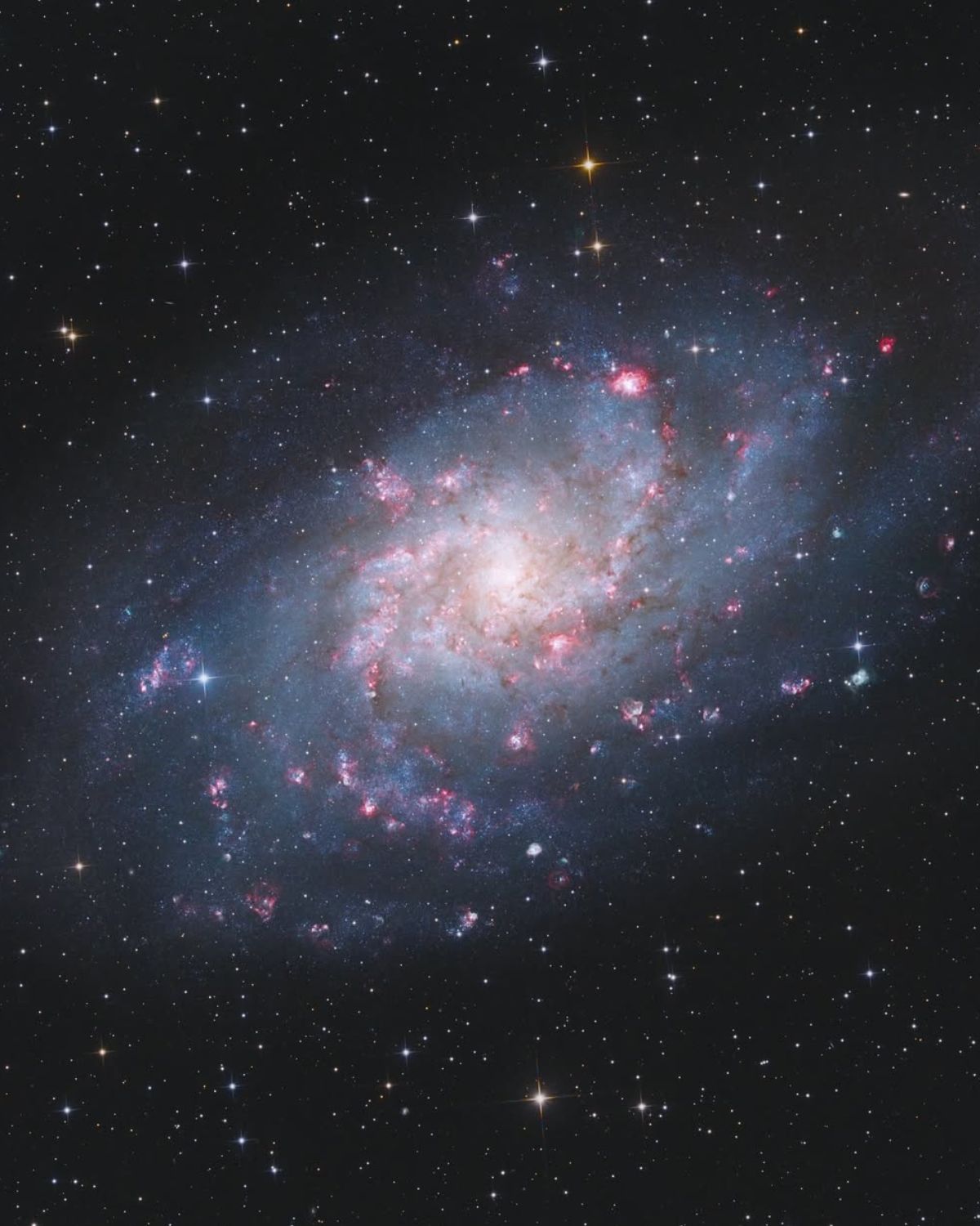 Zdjęcie przedstawiające kosmos, dokładnie M33, Galaktyki Trójkąta.