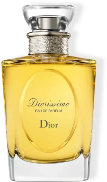 Babcine perfumy na lato 2025: Flakon perfum Dior Diorissimo Eau de Parfum z przezroczystego szkła o zaokrąglonym kształcie, z metalicznym zdobieniem na szyjce. Luksusowy, kwiatowy zapach z nutami konwalii, zielonych liści i jaśminu – ponadczasowy klasyk marki Dior.