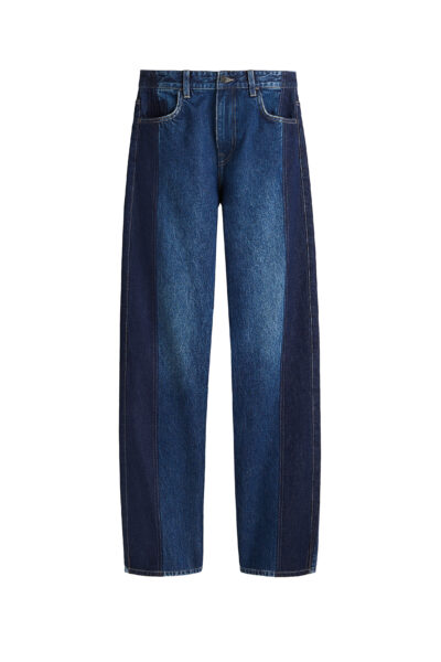 Spodnie z prostą, luźną nogawką w stylu retro, wykonane z dwóch odcieni niebieskiego denimu, tworzących efekt paneli z przodu i z tyłu. Klasyczne pięciokieszeniowe jeansy z nowoczesnym twistem.