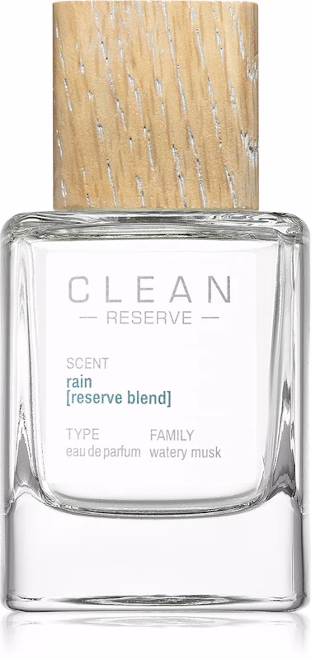 Zdjęcie produktowe Clean Reserve Rain z minimalistycznym flakonem i drewnianą nakrętką podkreślającą naturalny charakter kompozycji. Ten świeży, wodno-piżmowy zapach świetnie oddaje klimat stokrotkowych zapachów inspirowanych deszczem, czystym powietrzem i letnią łąką.